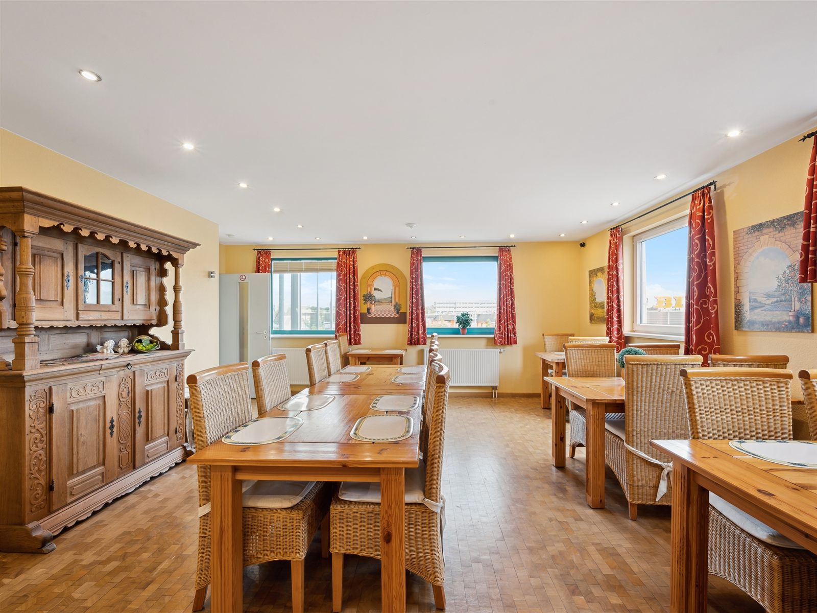 Lounge with wooden tables and cabinet for dining together