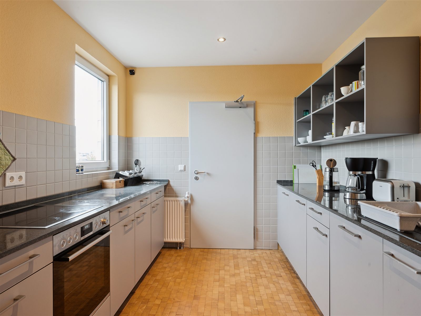 Shared kitchen with coffee maker, kettle and sink